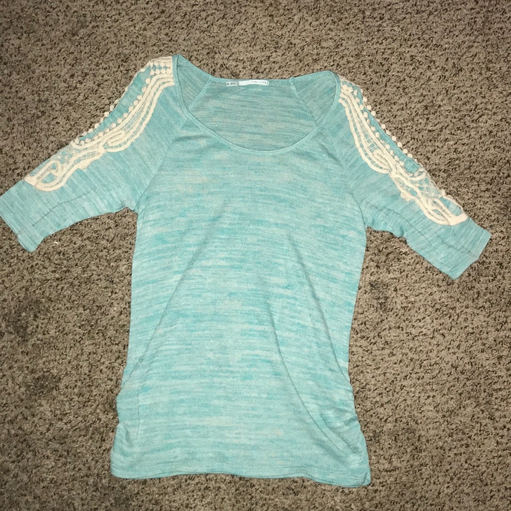 Maurice’s Blue shirt with detailed open shoulders